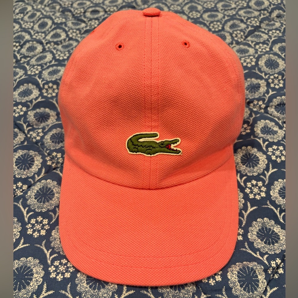 Lacoste coral pink baseball cap, excellent condition.
